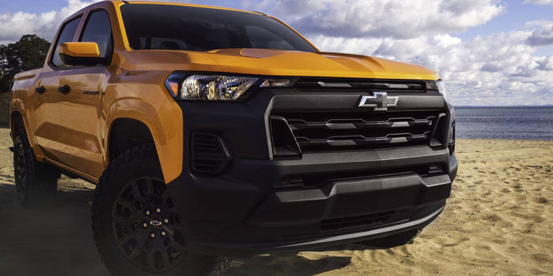 2026 Yellow Chevrolet Coloroda parked in a sandy Beach